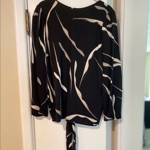 Blouse has an open back